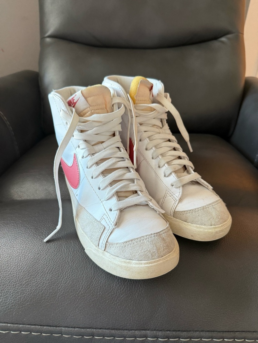 Nike Women’s High-Top Sneakers in White with Pink Swoosh